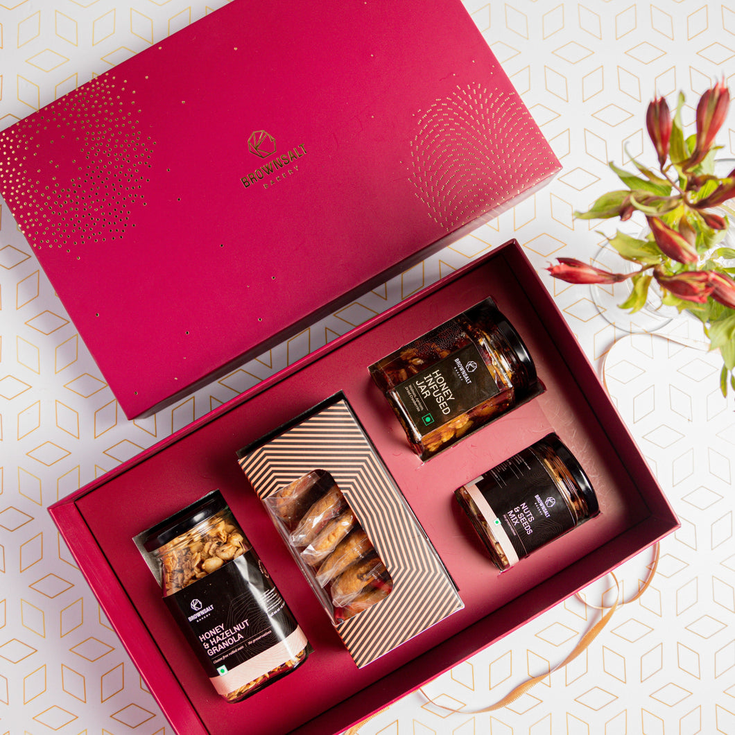 Angroos Loveful valentines day gift hampers with elegant Chocolates  Golden frame with love shaped photo collage Scented candle Almond nuts  bottle and greeting cards  Amazonin Grocery  Gourmet Foods
